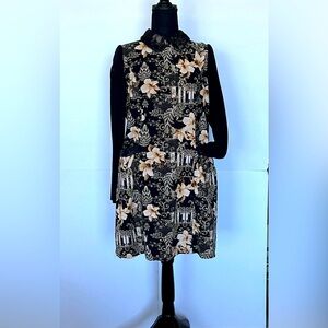 Black Floral Dress with sheer mesh sleeves .